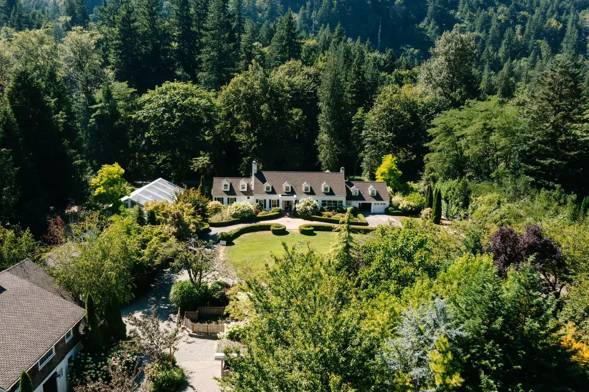 Aerial view of the 1940s manor at Fox Hollow Farm, a historic wedding and event venue in Issaquah near Seattle