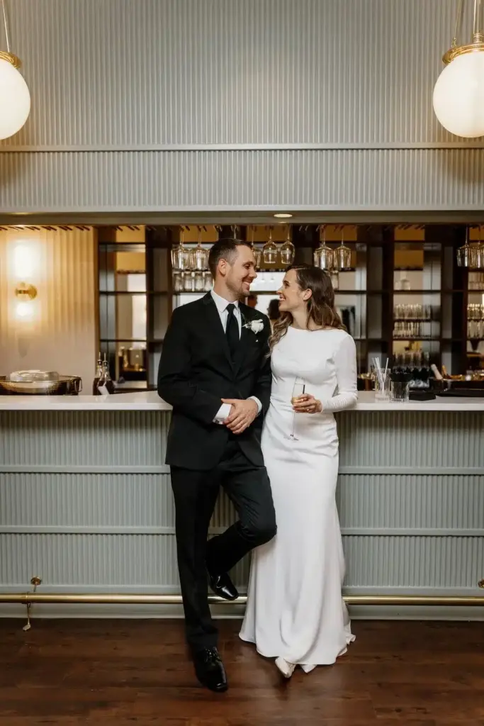 Newlyweds in the tasting room at Columbia Collective, a winery wedding venue in Woodinville
