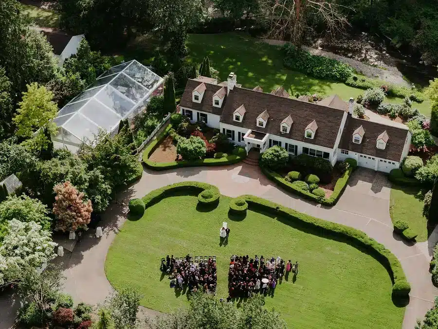 A large wedding ceremony on the lawn at Fox Hollow Farm